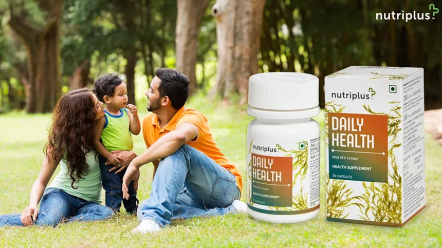 A happy family in the Park with Nutriplus Daily Health in frame