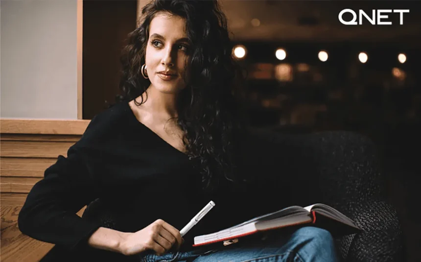 J K Rowling writing a book