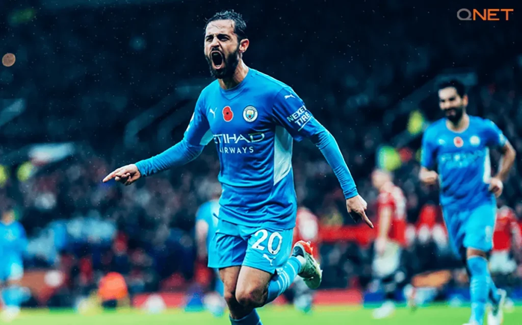 Bernardo Silva celebrating after scoring a goal against Manchester United in Premier League 2021/22
