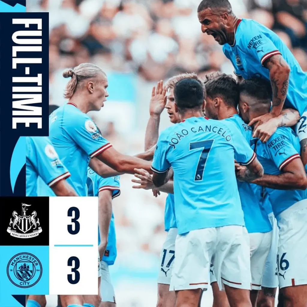 Manchester City players celebrate after scoring a goal against Newcastle United