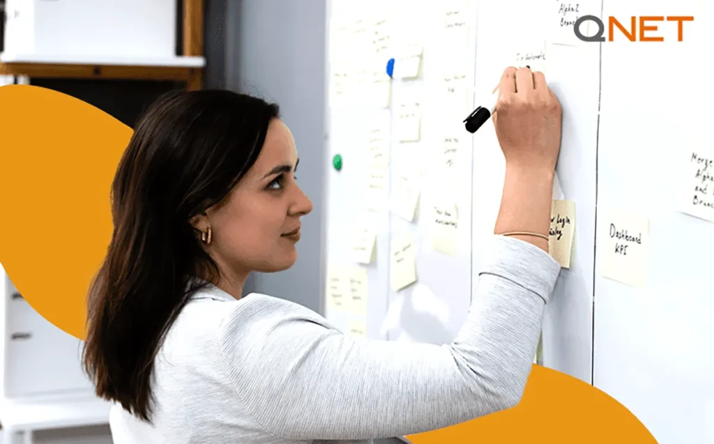 Entrepreneur writing on White board