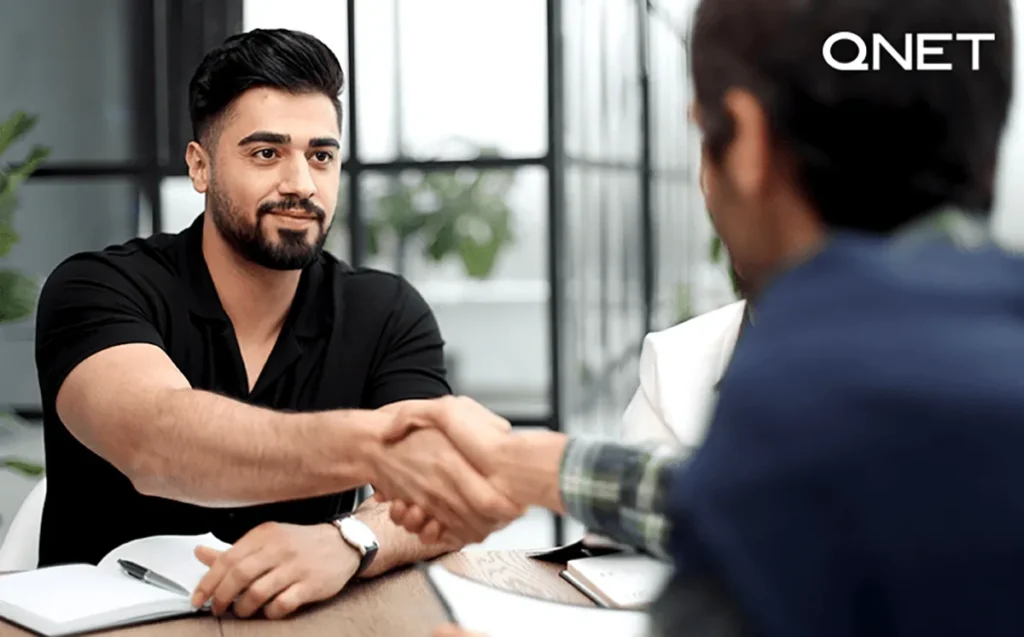 QNET Entrepreneurs shaking hands