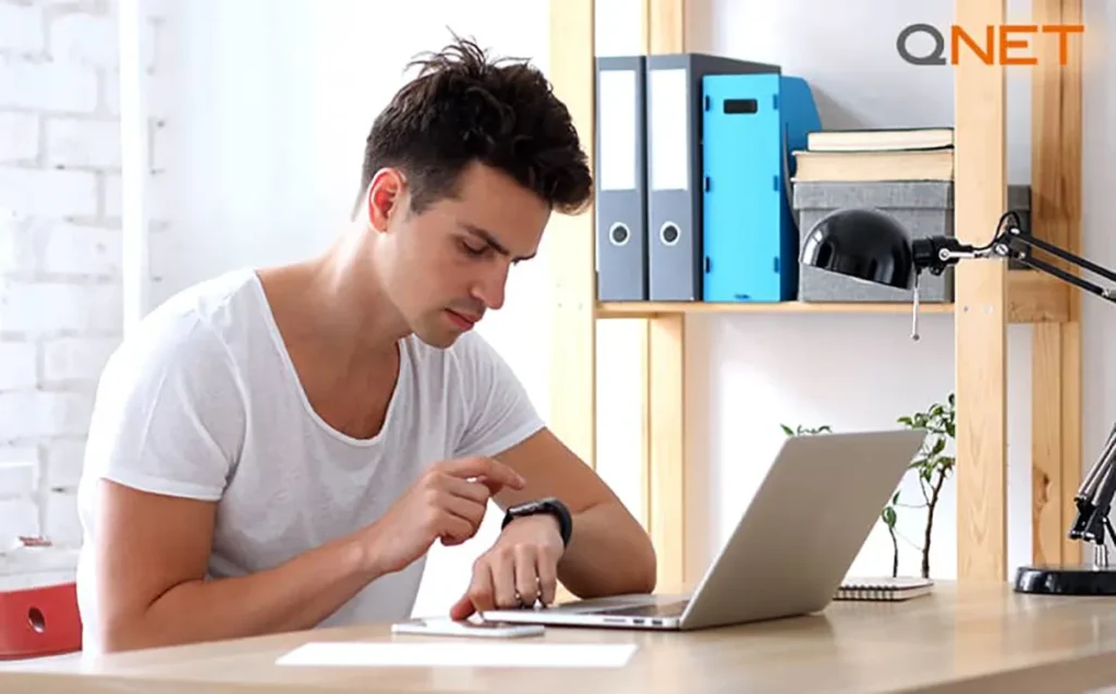 A man checking reminders notifications on his smartwatch | QNET India