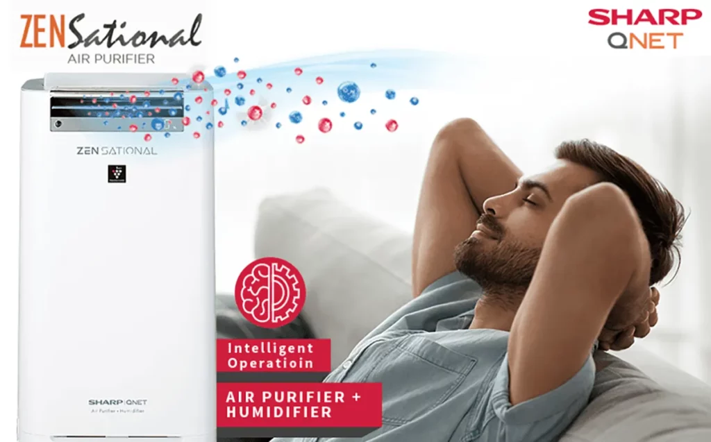 A young man breathing fresh air from SHARP Zensational Air Purifier