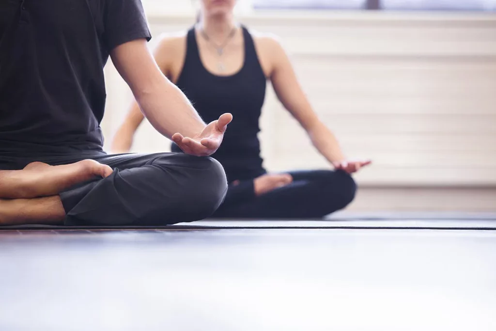 International Day of Yoga : A girl and a boy meditating. 