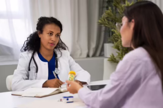 Doctor's Day 2026: Doctor consulting a patient and providing expert medical advice during a routine health check-up